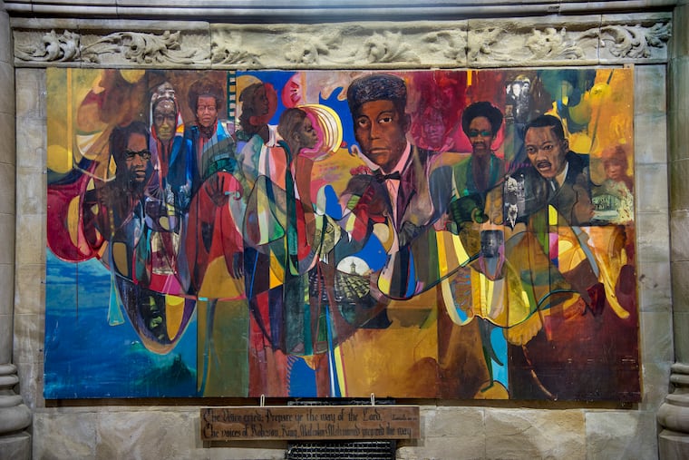 A painting by the artist Richard Watson at the Church of the Advocate depicts a range of historical figures, including Malcolm X, Elijah Muhammad, H. Rap Brown, and the Rev. Dr. Martin Luther King Jr. It was inspired by biblical passages of oppression and captivity, such as Isaiah 40:30: "The voice cried. Prepare ye the way of the LORD."
