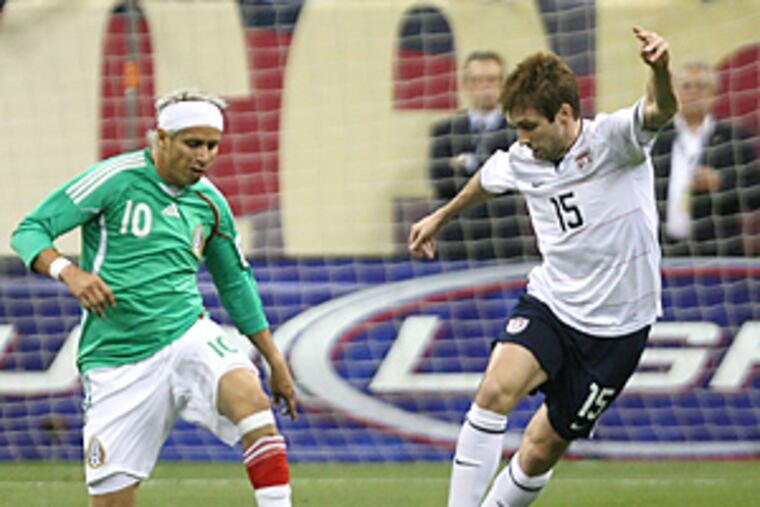 "It's a team, but there are no friends," says Philadelphia native Bobby Convey (right), who has played a number of times for the U.S. national team.