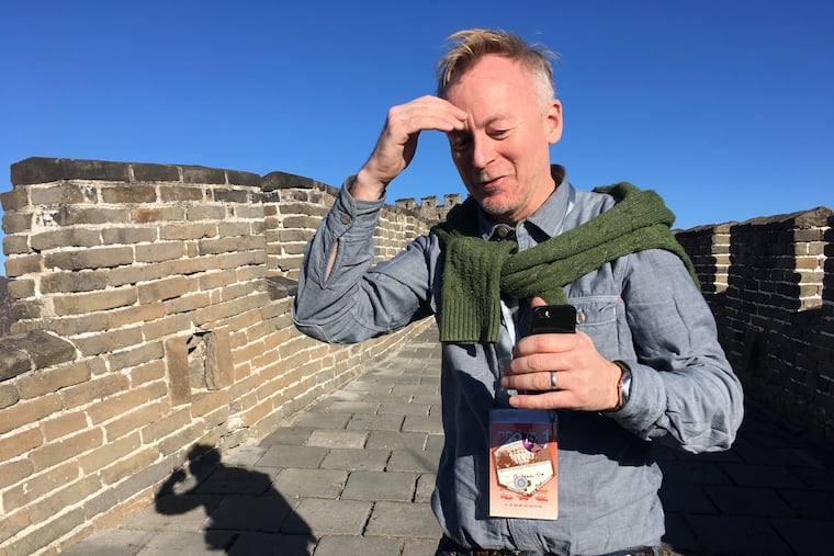 AP reporter Christopher Bodeen walks along the Mutianyu Great Wall section on the outskirts of Beijing, on Nov. 10, 2017, while covering Melania Trump’s visit to the wall.