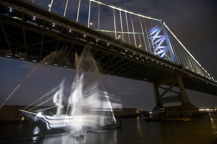 Our staff photographer captured this image of the Ghost Ship under the Benjamin Franklin Bridge. Try our tips to get great shots of your own.