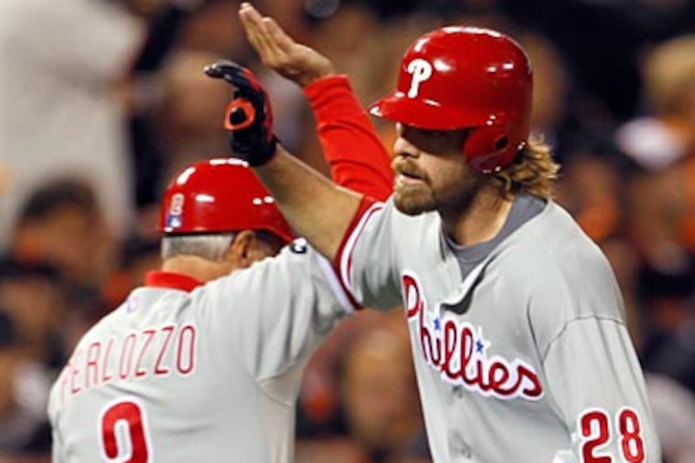 Jayson Werth rounds the bases after his 9th inning home run, his second in the NLCS. (Yong Kim / Staff Photographer)