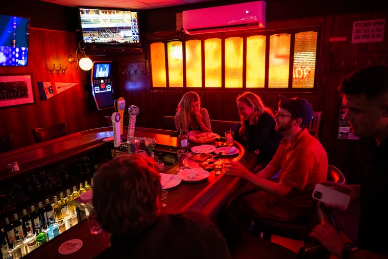 Patrons at Tony’s Baltimore Grill on an early Friday morning in Atlantic City, N.J.