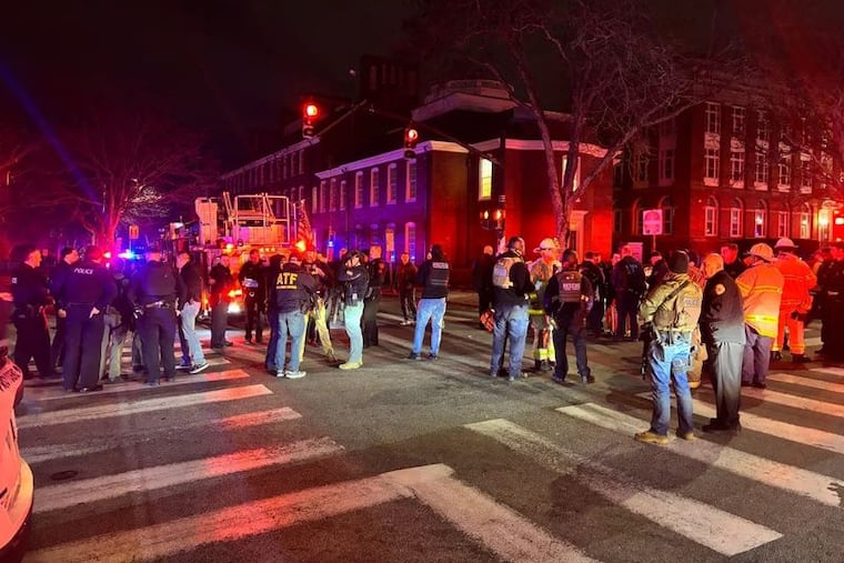 Police respond to an active shooter in the engineering building on the Brown University campus on Saturday.