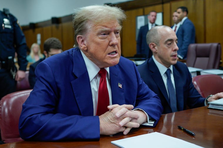 Former President Donald Trump awaits the start of proceedings at Manhattan criminal court on Tuesday in New York.