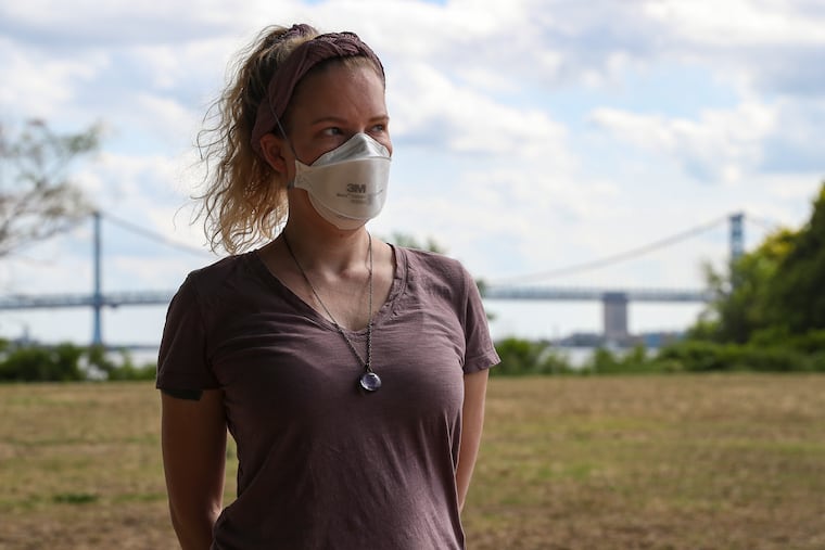 Madeline Layne poses for a portrait at Penn Treaty Park in Philadelphia on Wednesday, Aug. 10, 2022. Layne is a sex worker who is concerned that that limits on who can get the monkeypox vaccine is putting her and others at risk.