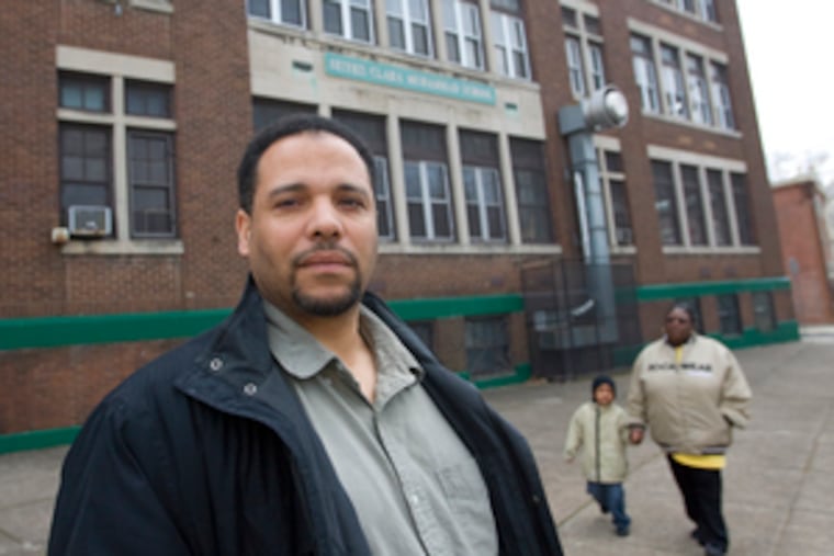 Hassan Ahmad (left) prays on the newly cleaned carpet. Imam Malik Mubashshir (above) took over after a 2006 fraud scandal.