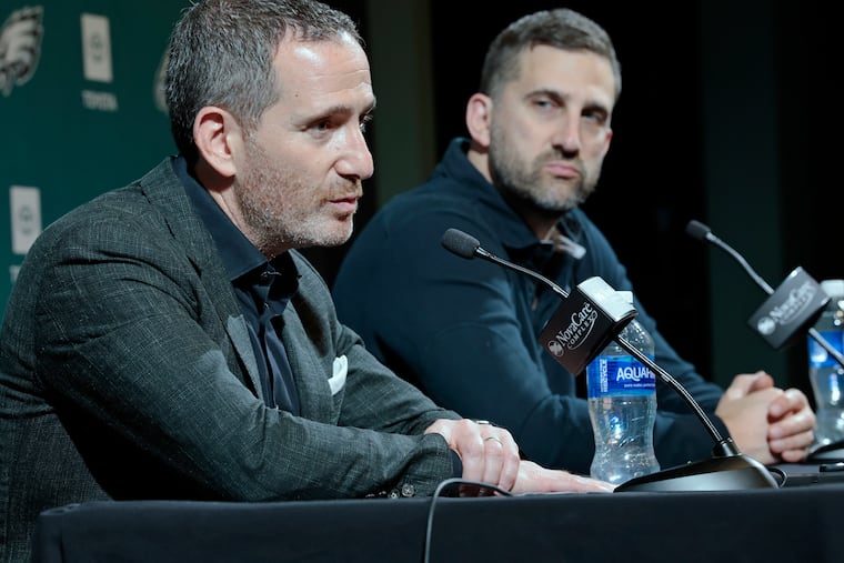 Eagles general manager Howie Roseman (left) and head coach Nick Sirianni talk about the draft at the NovaCare Complex on April 26.
