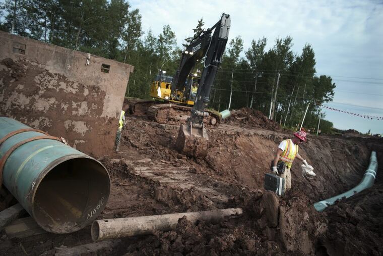 Workers in Minnesota in August replacing sections of a pipeline that stretches along the northern part of the state.