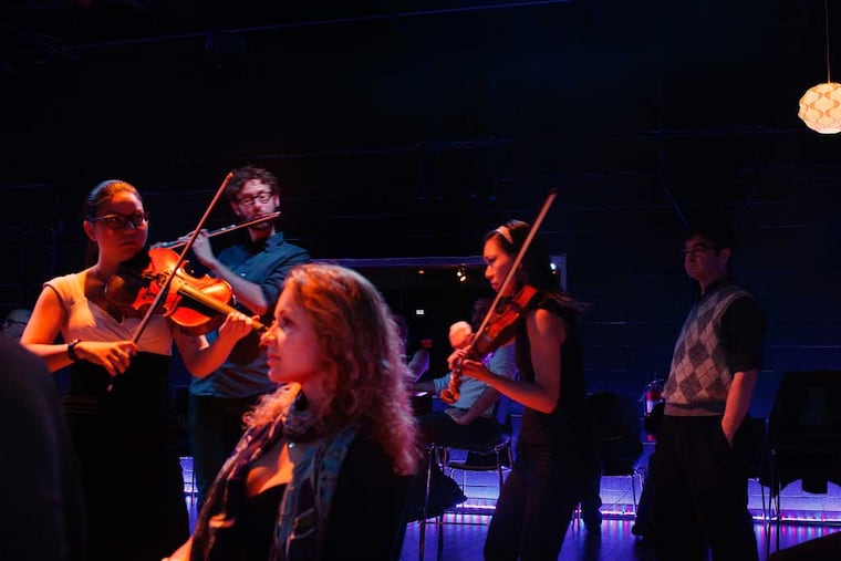 Curtis Institute musicians wandered among listeners in Kimmel Center's dimly lit, subterranean SEI Innova- tion Studio playing the hypnotic minimalist chamber work and manifesto "In C" by Terry Riley.