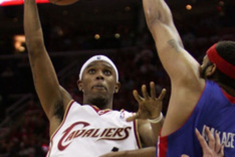 Cleveland rookie Daniel Gibson goes up against Detroit's Rasheed Wallace. Gibson scored 31 points - 19 in the fourth quarter.