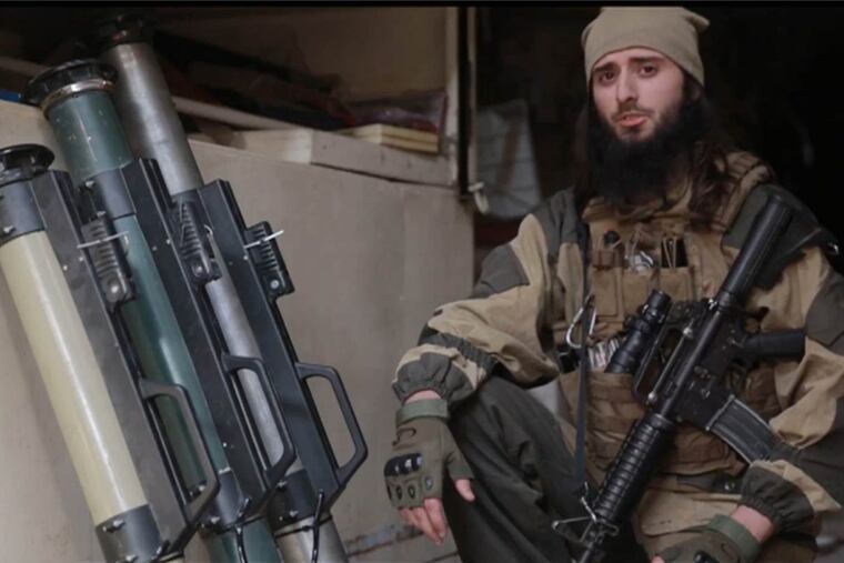 A screen grab from an Islamic State video showing Abu Hamza al-Amriki, who has been identified a Zulfi Hoxha of Margate, N.J.