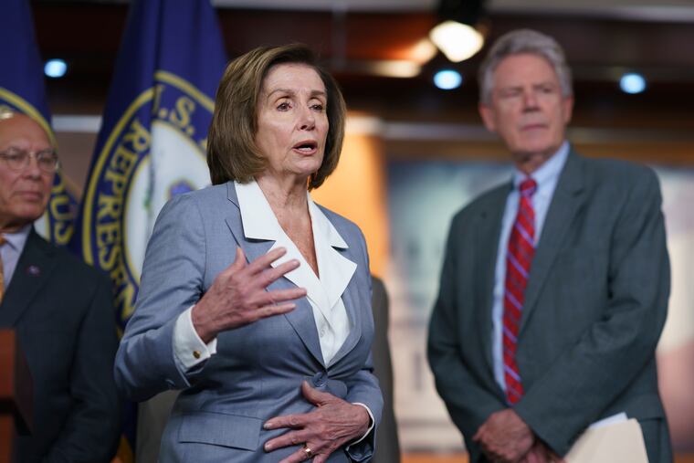 Speaker of the House Nancy Pelosi, D-Calif., responds to a question about her creation of a select committee to investigate the Jan. 6 insurrection at the Capitol, during a news conference, during a news conference to discuss a surface transportation bill, at the Capitol in Washington on Wednesday.