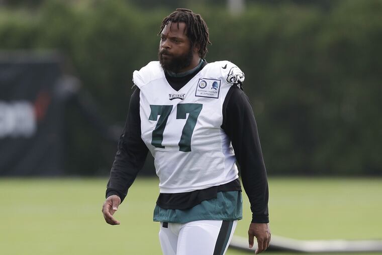 Eagles defensive linemen Michael Bennett walks the field during training camp at the NovaCare Complex in South Philadelphia on Saturday, July 28, 2018. YONG KIM / Staff Photographer