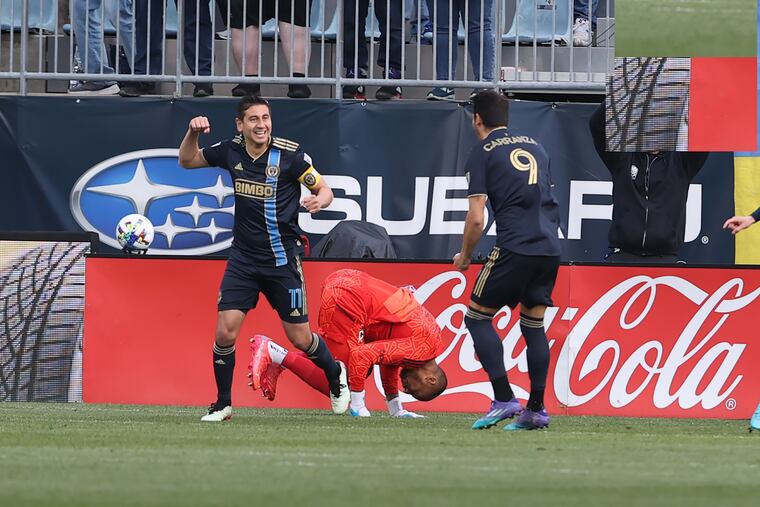 Alejandro Bedoya, left, and Julián Carranza of the Philadelphia Union after a goal in the first minute of play against Eloy Room, center, of Columbus during their game on April 9, 2022, at Subaru Stadium in Chester, PA. It was the only goal of the game.
