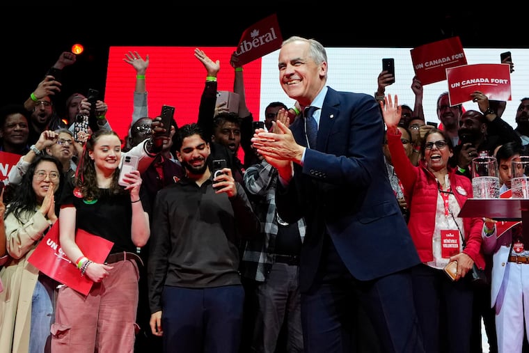 Canadian Prime Minister Mark Carney arrives on stage at his campaign headquarters after the Liberal Party won the Canadian election on Tuesday, April 29, 2025.
