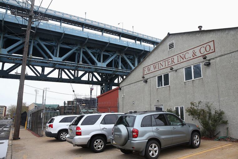 The F.W. Winter building site under the Ben Franklin Bridge where Interstate Outdoor Advertising wants to erect a giant billboard. TIM TAI / STAFF PHOTOGRAPHER