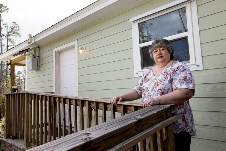 Becky Nixon at her new home in Fountain, Fla., in February. Her previous home was damaged by Hurricane Michael in 2018.