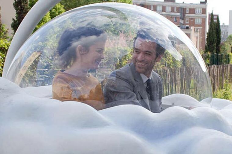 Colin and Chlo (Romain Duris and Audrey Tautou) on an adventure in a cloud-shaped gondola car in "Mood Indigo."