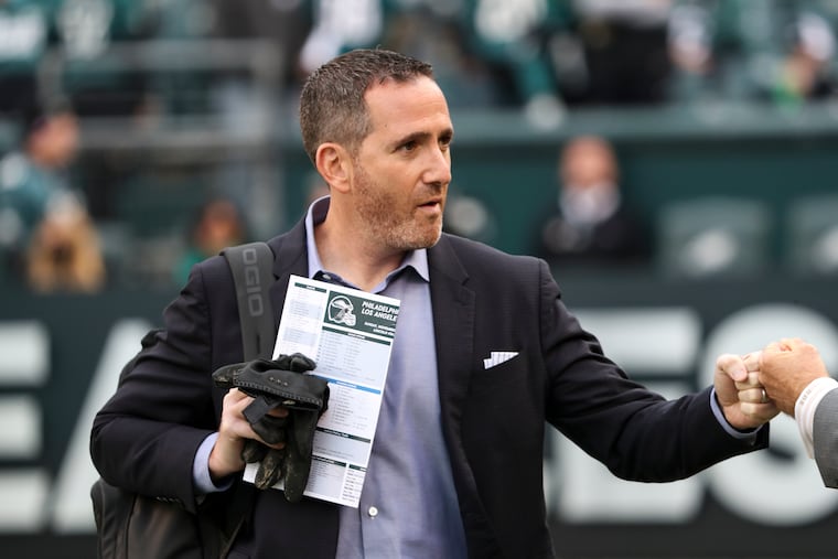 Philadelphia Eagles Howie Roseman walks on the field before the game against the Los Angeles Chargers at Lincoln Financial Field in Philadelphia on Sunday, Nov. 7, 2021.