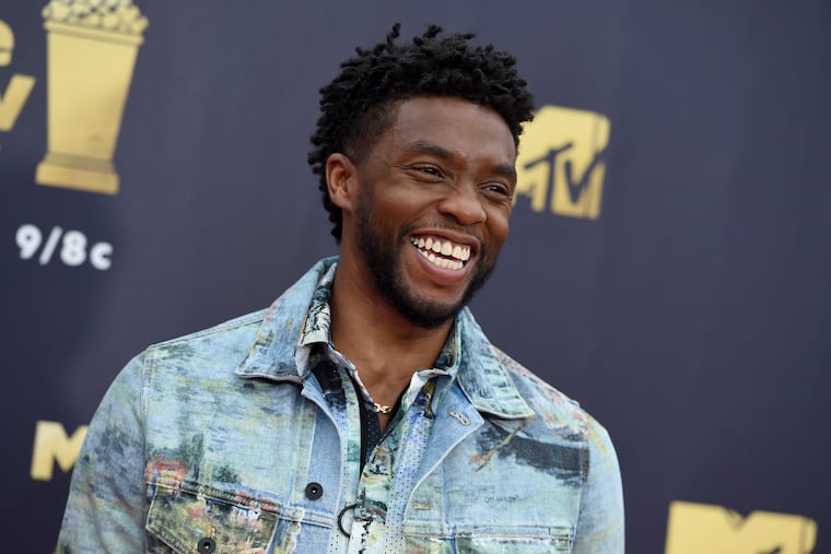 In this Saturday, June 16, 2018 file photo, Chadwick Boseman arrives at the MTV Movie and TV Awards at the Barker Hangar in Santa Monica, Calif. Actor Chadwick Boseman, who played Black icons Jackie Robinson and James Brown before finding fame as the regal Black Panther in the Marvel cinematic universe, has died of cancer. His representative says Boseman died Friday, Aug. 28, 2020 in Los Angeles after a four-year battle with colon cancer. He was 43.