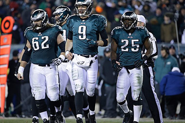 Eagles center Jason Kelce, quarterback Nick Foles and running back LeSean McCoy. (Matt Rourke/AP)