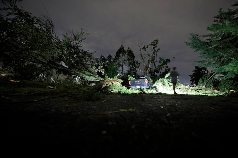 Trees fell on a house and a truck and across Shadow Place in Mantua, N.J., on Tuesday, Sept. 1, 2026, after strong evening storms left a trail of destruction around the area.