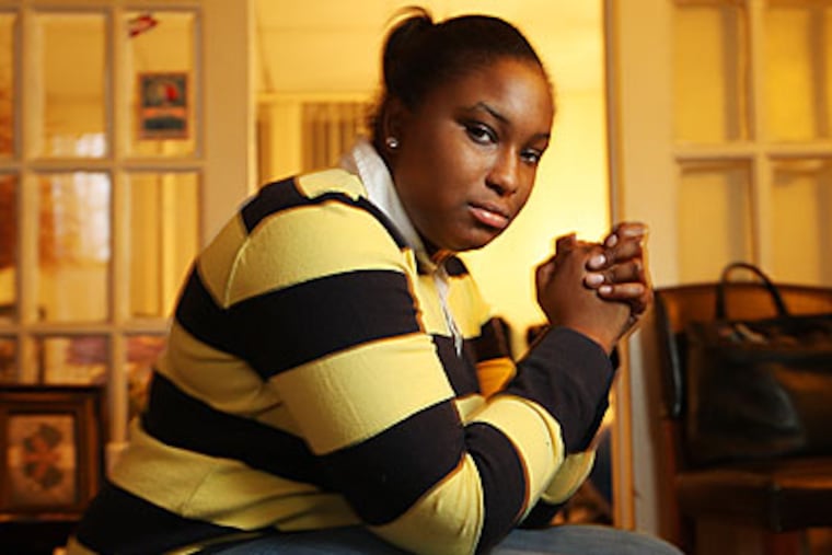 Ronada Cyrus had been working as a seasonal worker and was laid off. She can not get unemployment because of Pennsylvania regulations. (Michael Bryant/Staff )