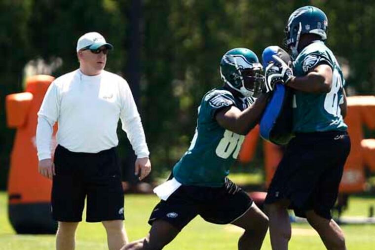 Tom Melvin has been with Andy Reid since he took the Eagles head-coaching job and has been his tight ends coach since 2002. This is a 2009 training camp photo of him overseeing an Eagles blocking drill.