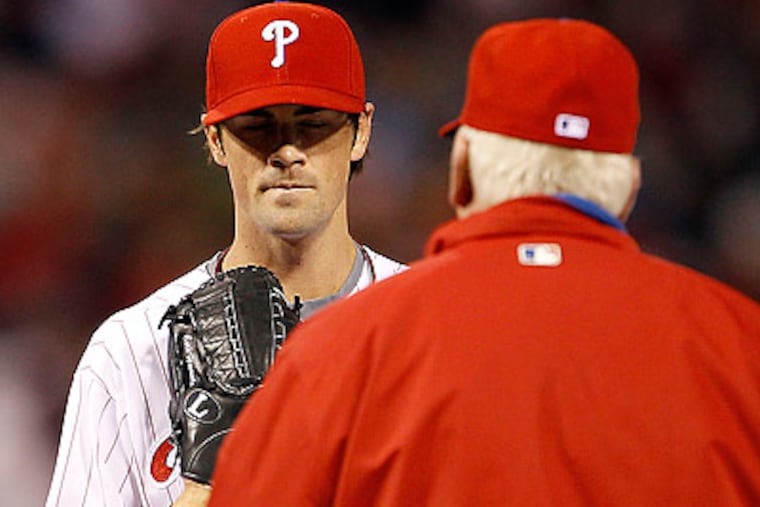 Cole Hamels was booed by Phillies fans after giving up six runs in one inning to the Mets. (Yong Kim/Staff Photographer)