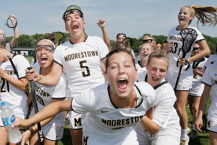Moorestown, pictured celebrating last year's South Group 3 final win, defended their title with a 17-3 win against Ocean City in the 2019 title game on Thursday.
\