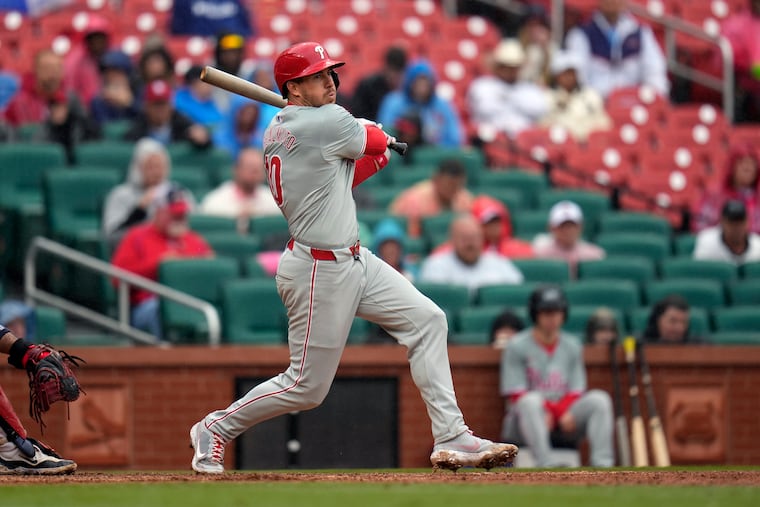 The Phillies' J.T. Realmuto hits a single in the sixth inning against the Cardinals on Wednesday in St. Louis.