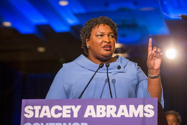 FILE - Georgia gubernatorial candidate Stacey Abrams speaks to her supporters during her election night watch party at the Hyatt Regency in Atlanta, Wednesday, Nov. 7, 2018.