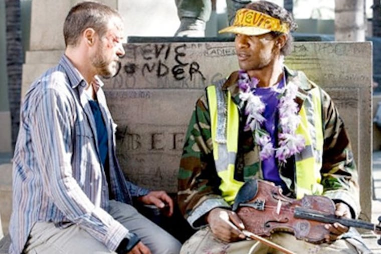 Robert Downey Jr. stars as Steve Lopez and Jamie Foxx stars as Nathaniel Ayers in DreamWorks' The Soloist (2009) (Copyright © DreamWorks Pictures)