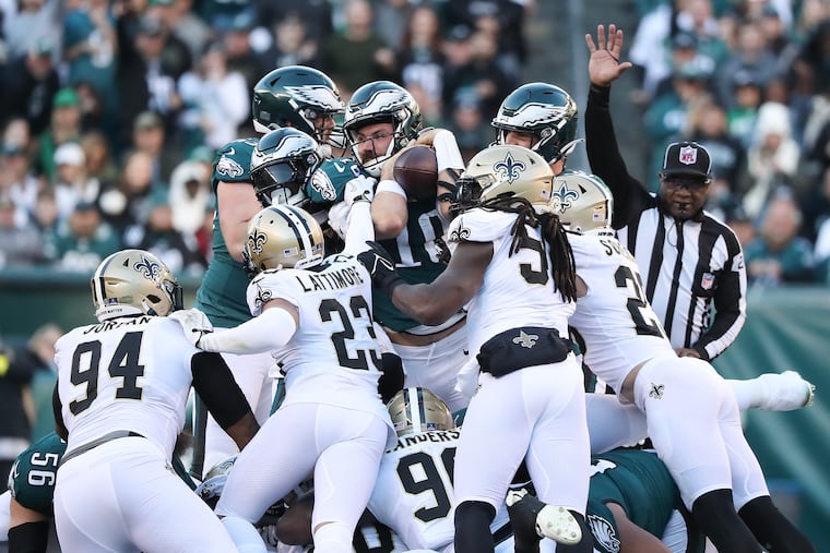 Eagles quarterback Gardner Minshew attempts to rush for a first down on a fourth-down play during the fourth quarter against the New Orleans Saints. He fell short.
