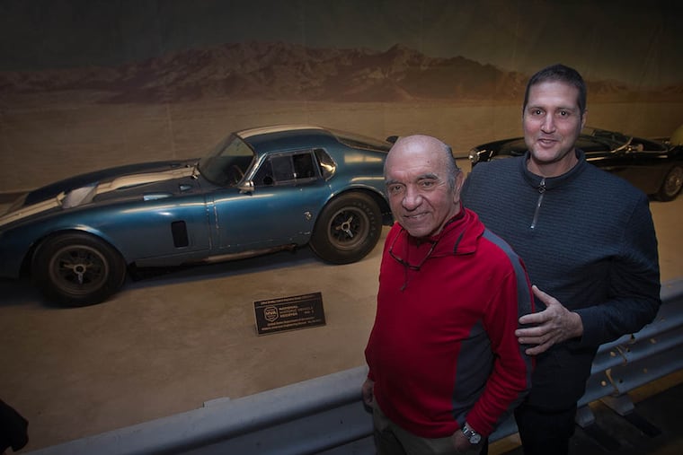 Armando Lorenzo Munnet (right), who stars in the documentary "Havana Motor Club," with Frederick Simeone, founder of the Simeone Foundation Automotive Museum. The film is about drag racing in Cuba. (ALEJANDRO A. ALVAREZ / Staff Photographer)