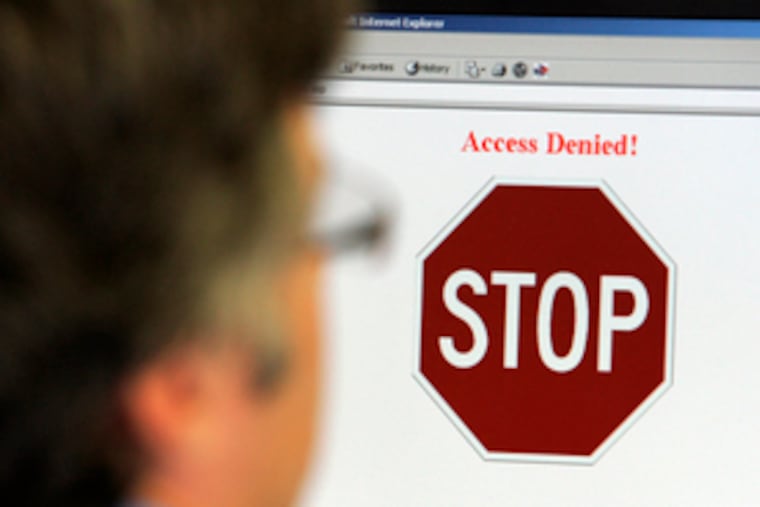 As part of his training, Michael Trpkosh tries to hack into a dummy bank Web site at a facility in Bushkills, Pa. "Some people like studying World War II," he said. "I like studying this."