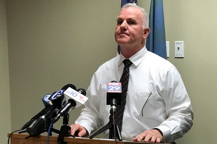 Philadelphia Police Capt. Mark Burgmann, commanding officer of the Special Victims Unit, briefs reporters.