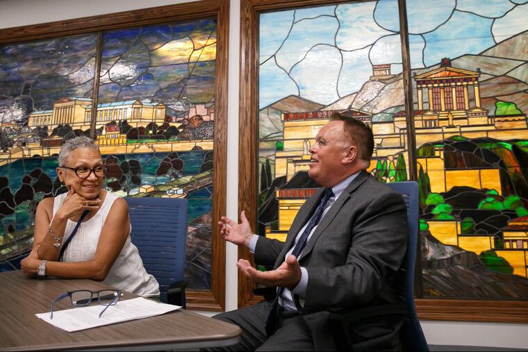 New Philadelphia school board members Leticia Egea-Hinton, left, and Christopher McGinley in a new conference room in the board offices.