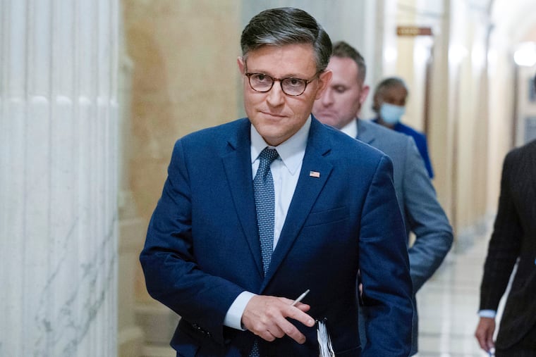 Speaker of the House Mike Johnson, R-La., walks to a meeting at the Capitol in Washington, Sept. 11, 2024.