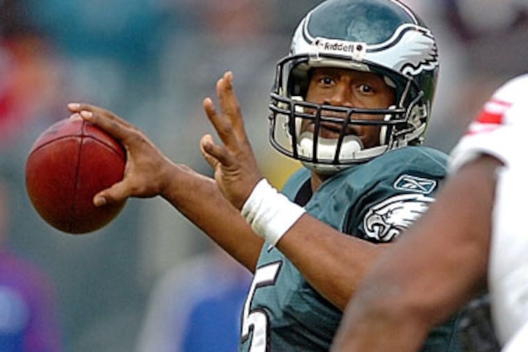 Donovan McNabb was 17 of 23 for 243 yards and three touchdowns as he led the Eagles to a dominating 40-17 victory last week against the Giants. (Clem Murray / Staff Photographer)