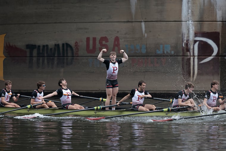 St. Joseph’s Prep celebrates winning the boys senior eight on the final day of the Stotesbury Cup Regatta on the Schuylkill River.