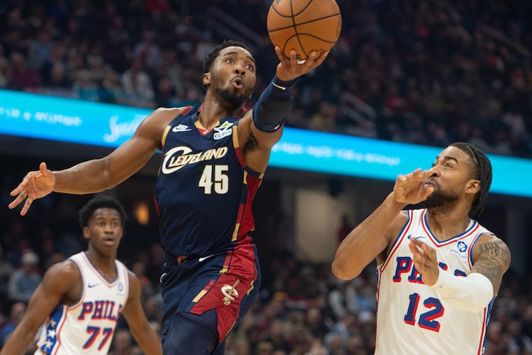 Cavaliers' Donovan Mitchell (center) scored 46 points against the Sixers on Wednesday night.