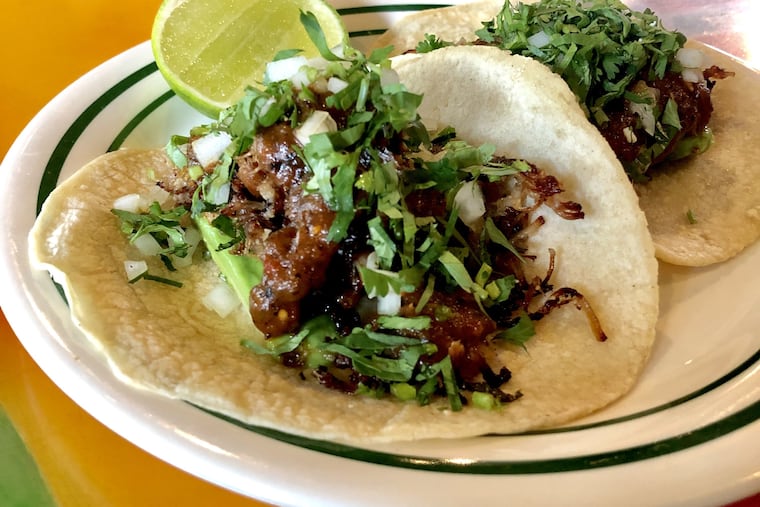 Carnitas tacos at Taqueria Feliz in Manayunk.