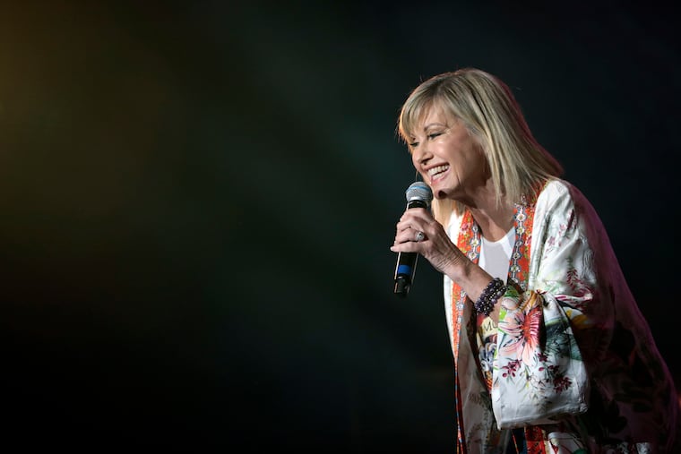 Olivia Newton-John performs during Fire Fight Australia at ANZ Stadium on Feb. 16, 2020, in Sydney. Newton-John died Monday, Aug. 8, 2022, at age 73.
