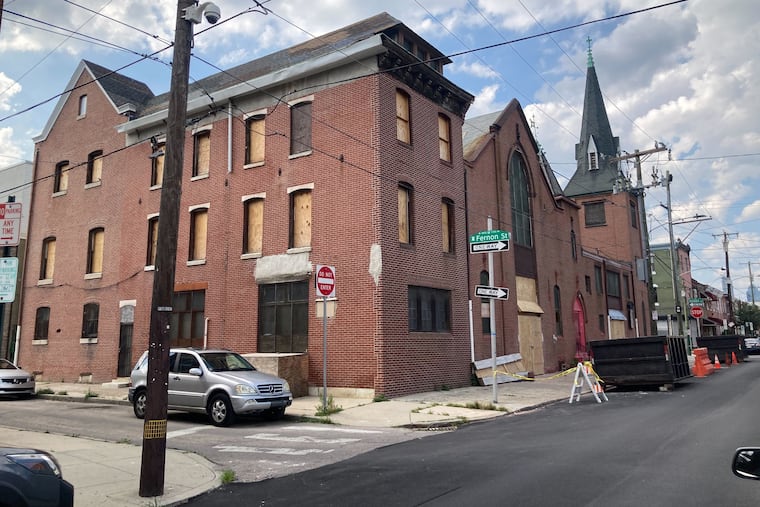 The south facing side of 1800 Tasker St., as seen during the summer of 2025.