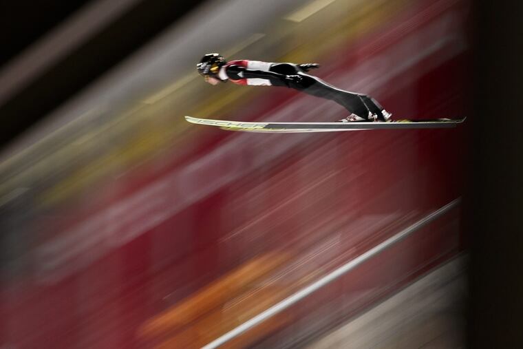 Andreas Wellinger, of Germany, soars through the air during the men’s ski jumping qualifier ahead of the 2018 Winter Olympics in Pyeongchang, South Korea, Thursday, Feb. 8, 2018.
