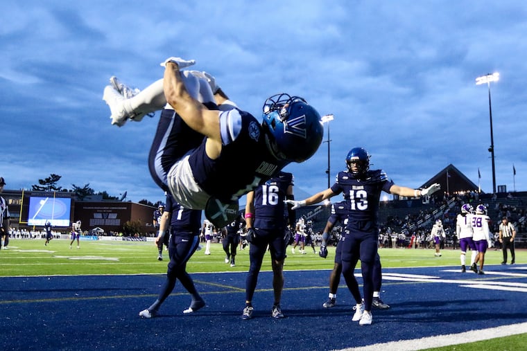 Villanova wide receiver Luke Colella (1) does a backflip after his fourth-quarter touchdown against Albany on Saturday.