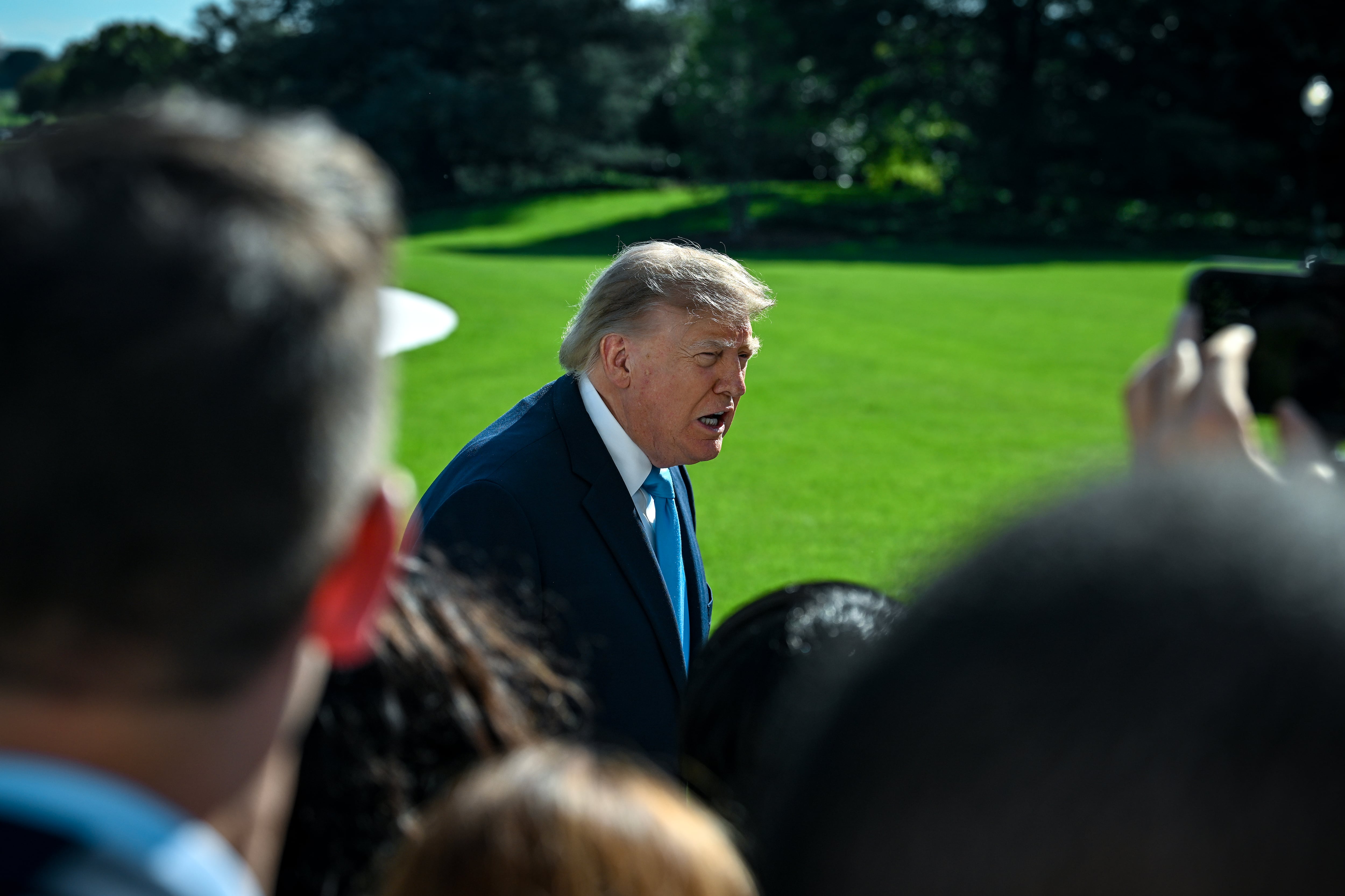 Facing backlash, Trump says his super PAC will pay for taxpayer-funded ads