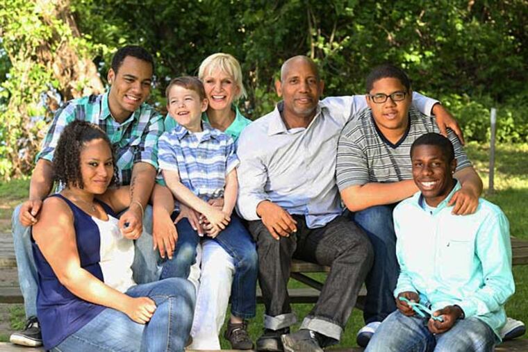 John Thomas, 55, and his wife Jane, 53, with (from left) Alaina, Isaiah, Jordan Jonathan, and Dontae. Says John Thomas: “Most of my peers are wondering, ‘Will my 401(k) last? Will I have enough money in retirement? When can I start gallivanting around?’ We won’t live a life of luxury. We’ll have enough.”