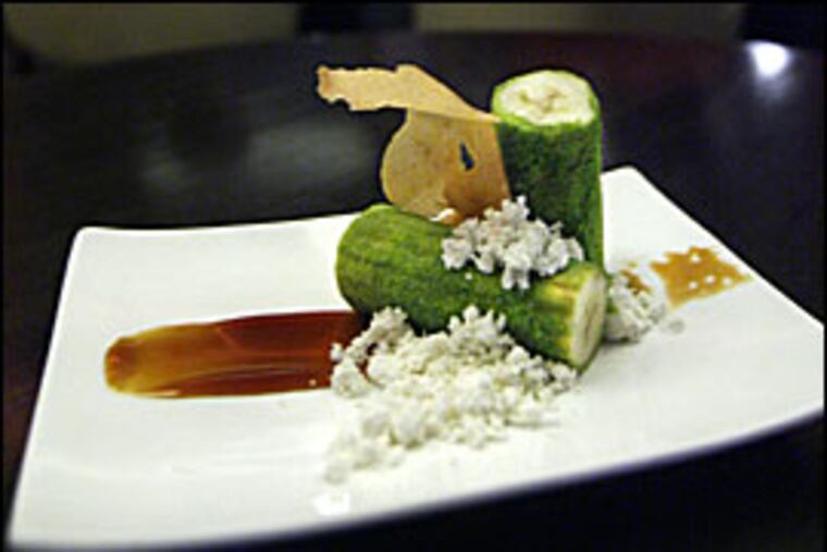 A dessert that hits the mark: Warm curried banana rolled in cilantro bread crumbs with salted caramel and vanilla rum powder.